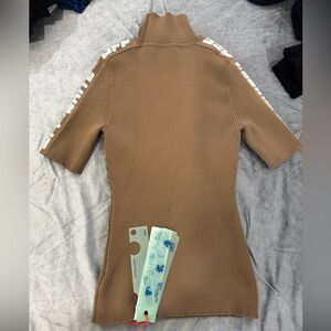 NWT! Off-White
logo-trim ribbed T-shirt
Size: 38 
(More like a size XS/S)